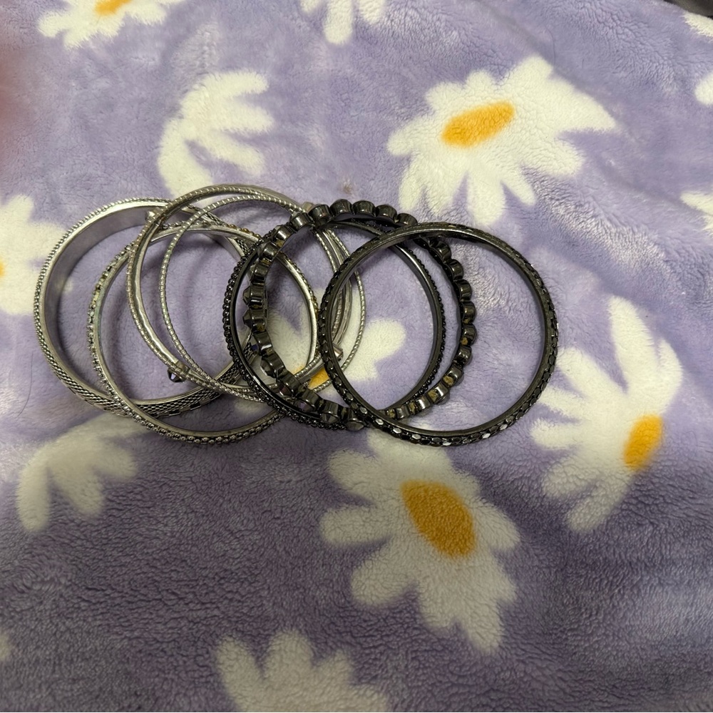 Stylish Silver and Black Bangle Set
You get all for one low price - Picture 11 of 12